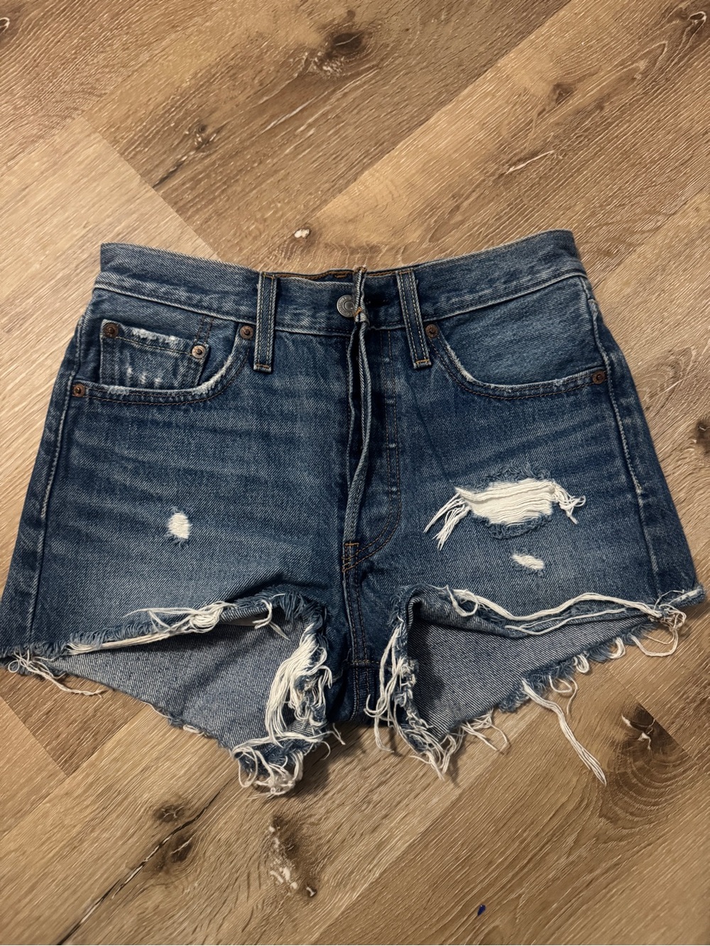 Levi’s 501 Distressed Blue Denim Cutoff Shorts